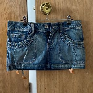 Stone washed denim mini skirt. 30-31”waist.